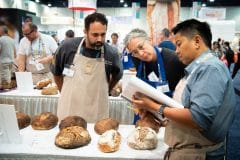 Judging for the Tiptree World Bread Awards USA at IBIE 2022