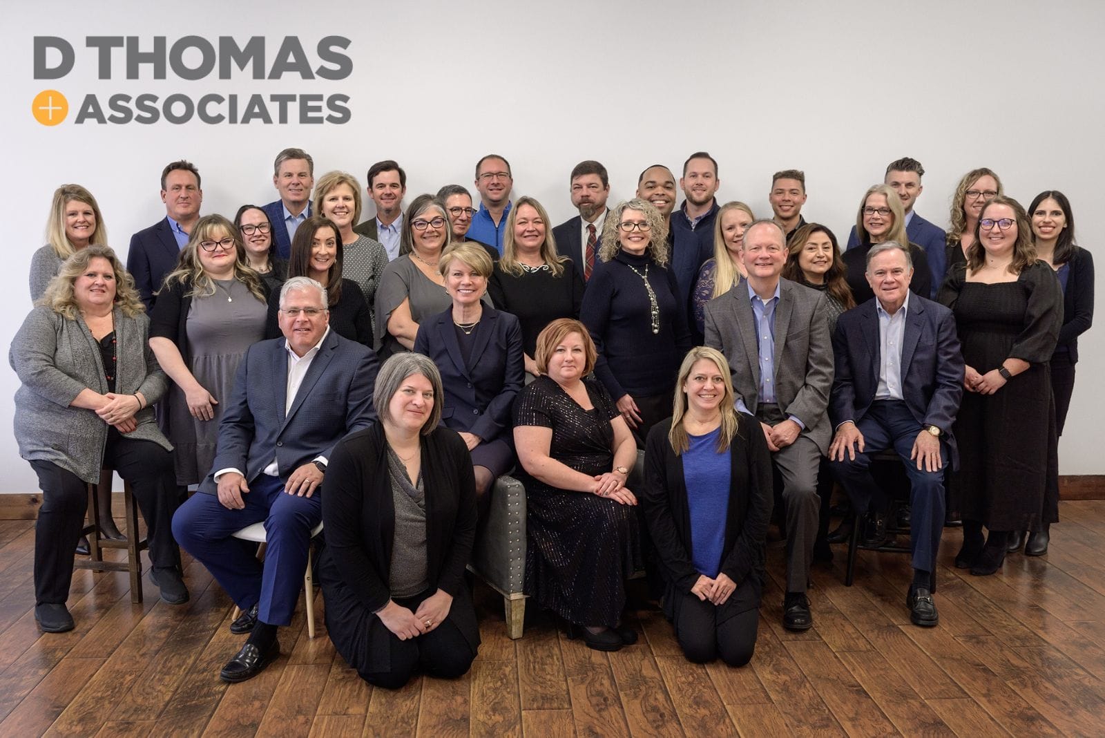 group photo of D Thomas + Associate employees
