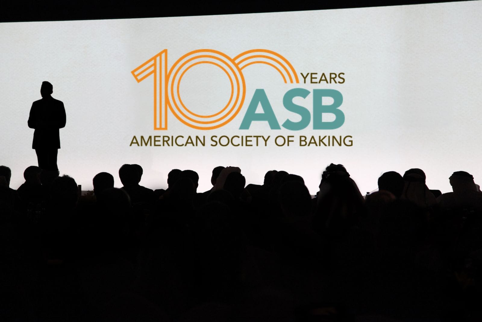 Shadows of a presentation with the American Society of Baking logo