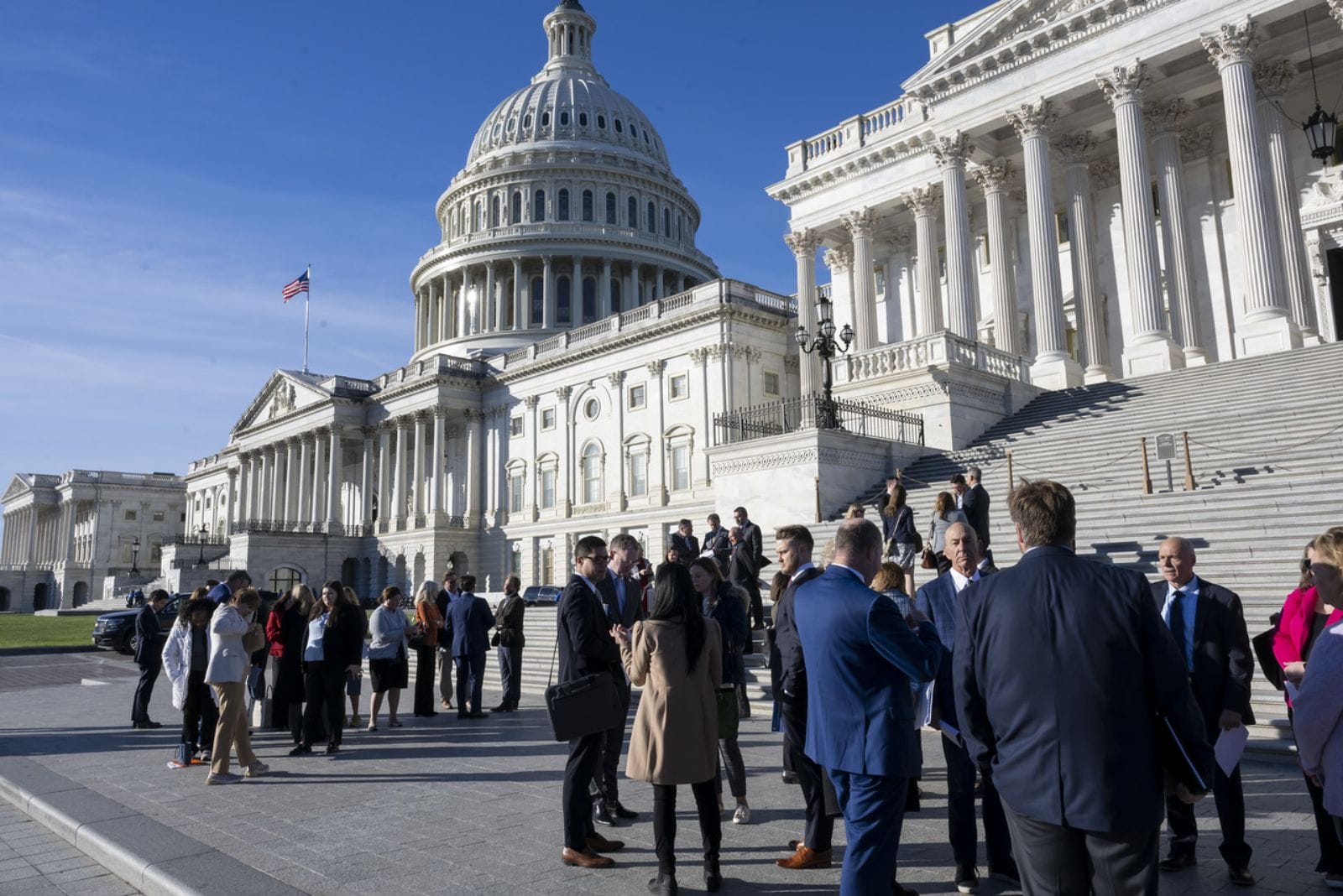 Participants of the 2023 Bakers Fly-In and Policy Summit talking on the steps of the US Capital