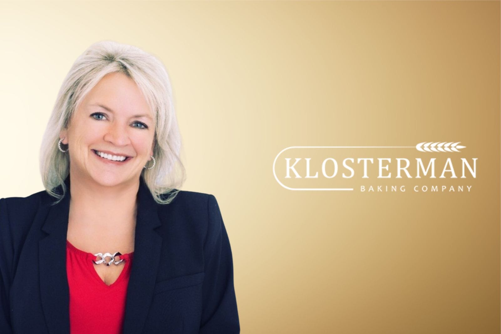 Blonde woman CFO in black blazer and red top next to Klosterman Baking Co. logo