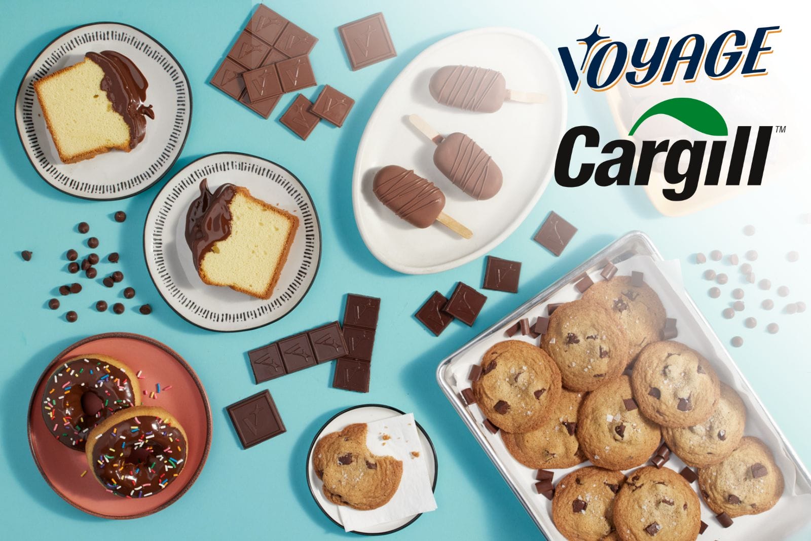 Voyage foods and Cargill logos on top of varying chocolate-flavored baked goods