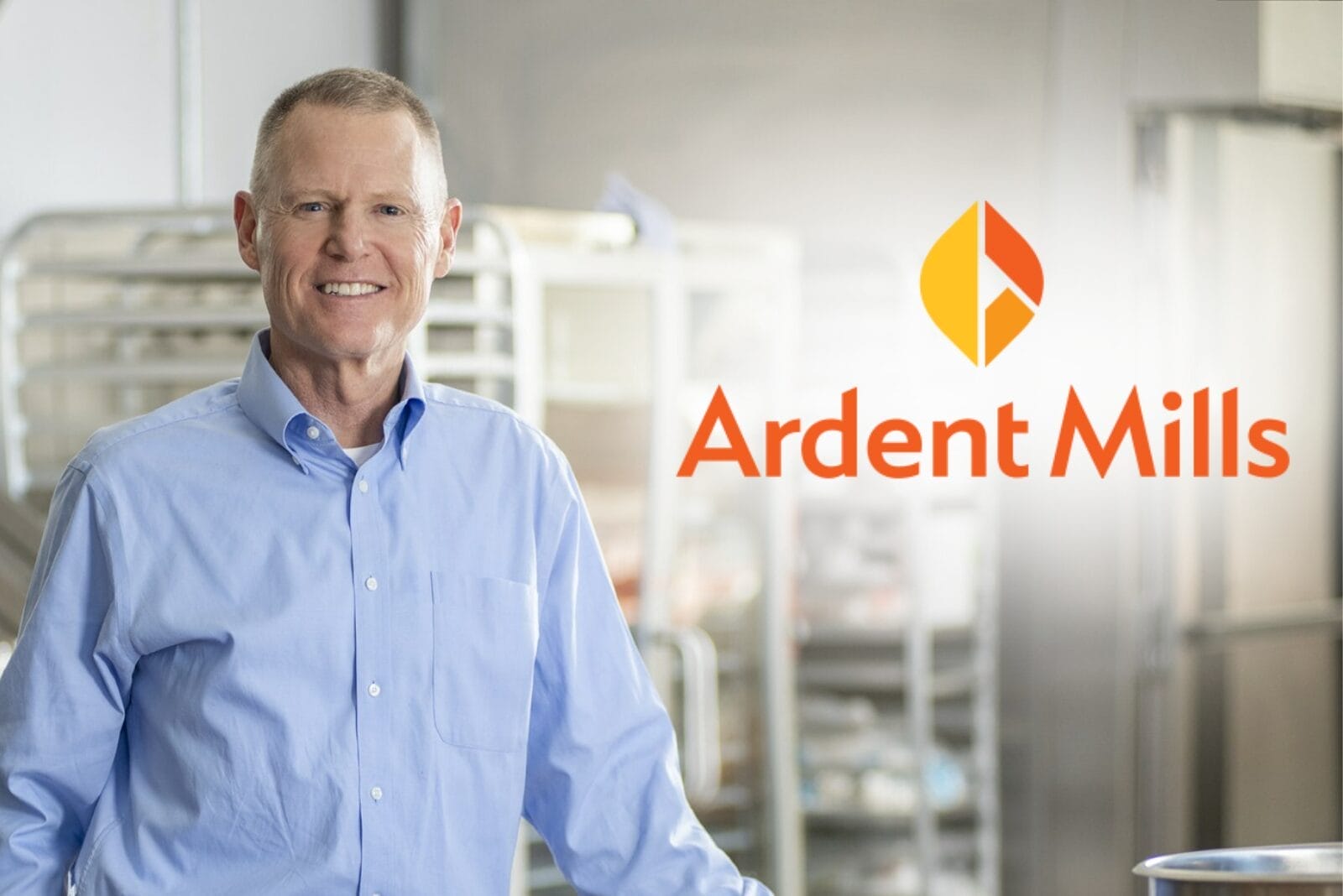Dan Dye in a commercial kitchen to the left of the Ardent Mills logo