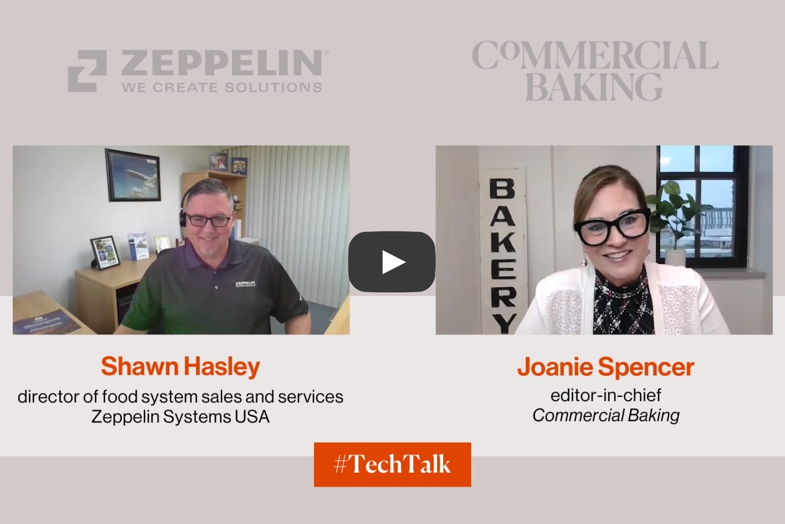 Two people smiling and talking about a featured technology from Zeppelin Systems USA.