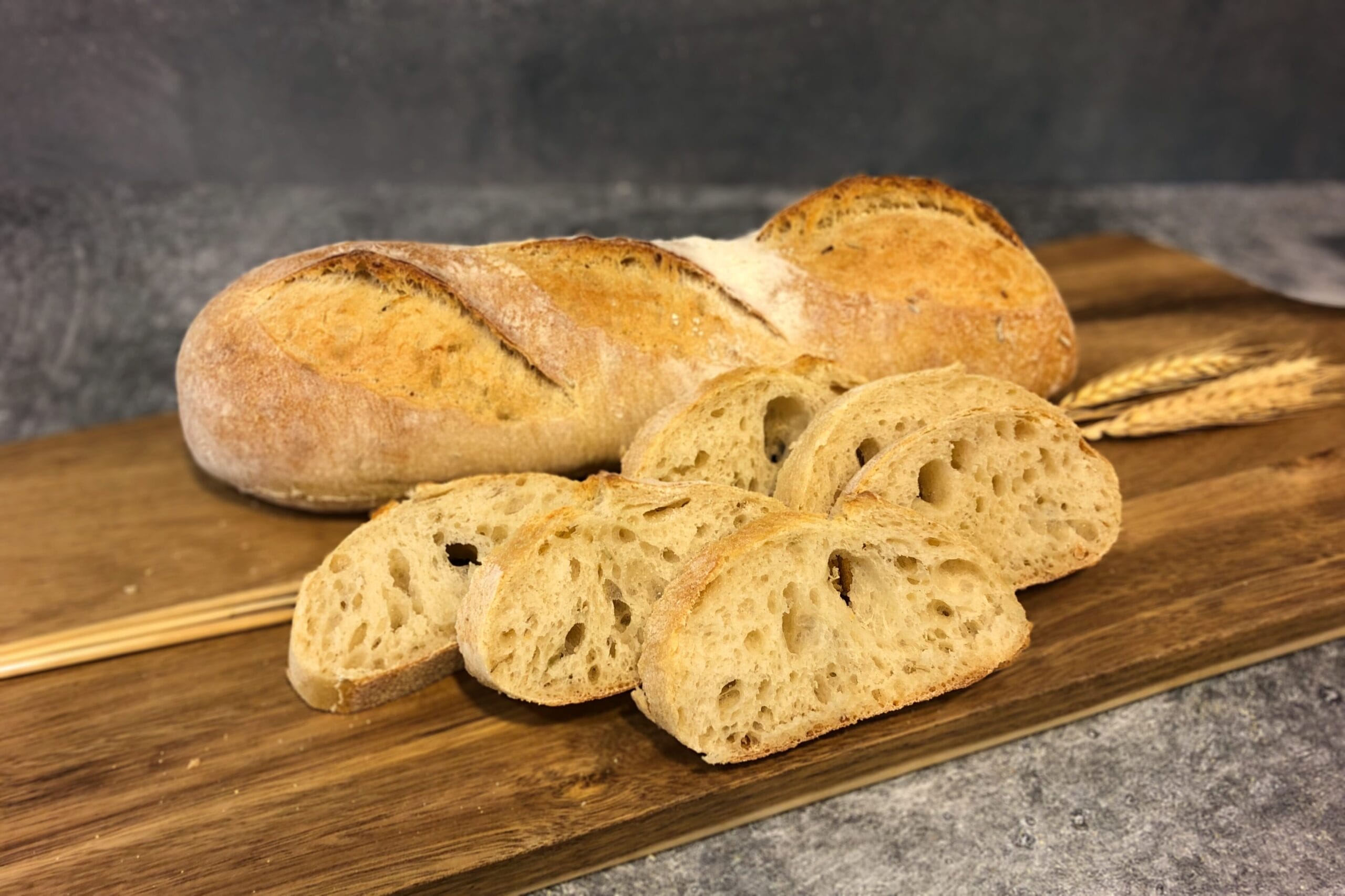 Artisanal bread on cutting board.