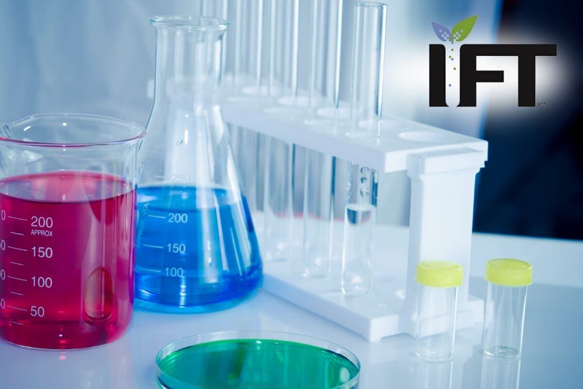 Lab beakers filled with colored liquid and IFT logo in corner.