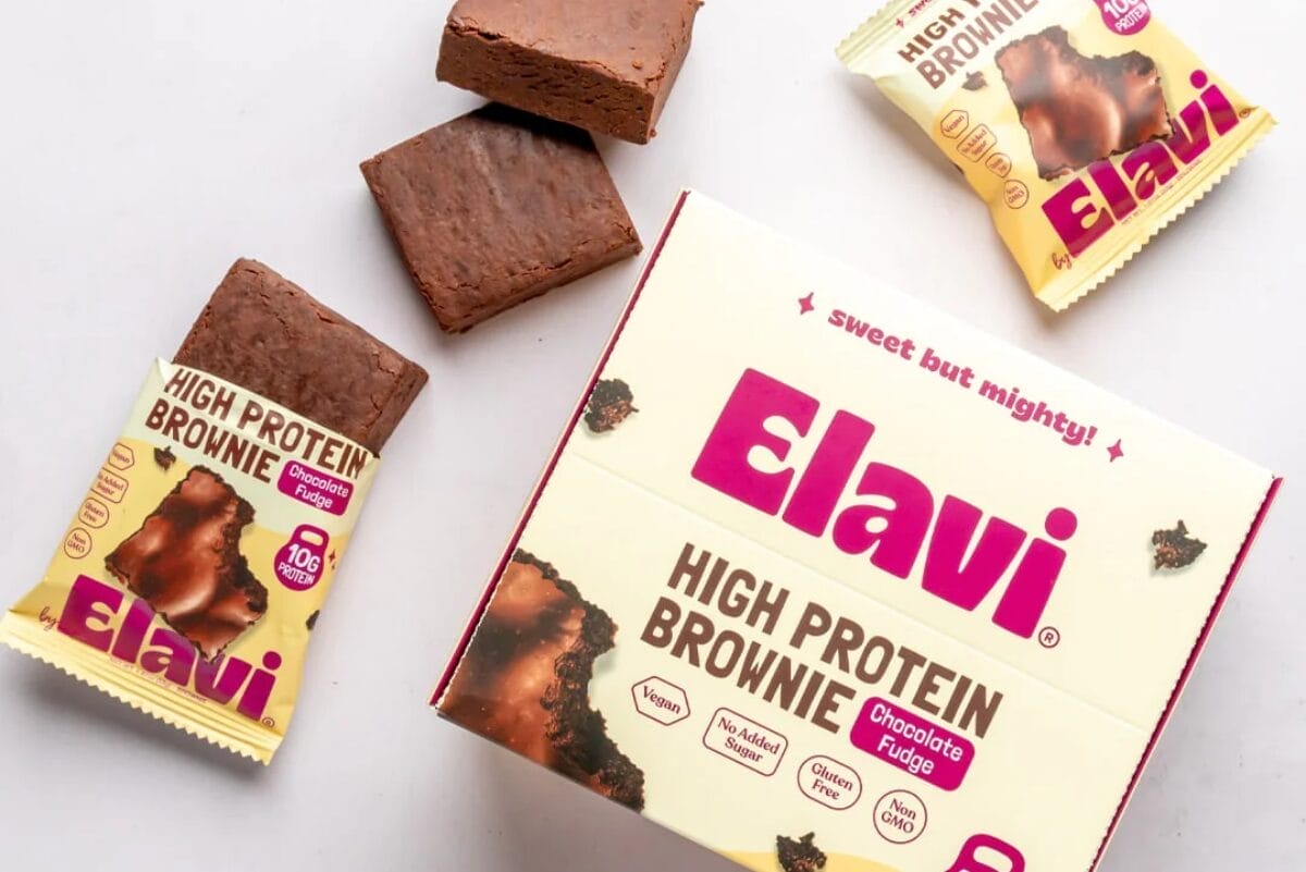 Flat lay of Elavi Protein Brownie box and wrapped packages