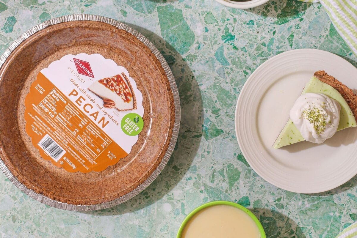 top view of Diamond of California Gluten-Free Pecan Pie Crust next to slice of lime pie on plate