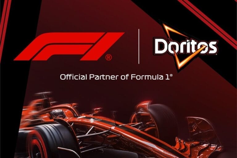 Formula 1 and Doritos logo above Formula 1 race car on dark red background