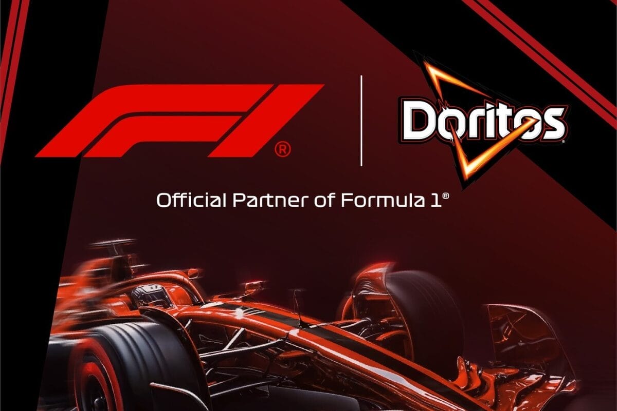 Formula 1 and Doritos logo above Formula 1 race car on dark red background