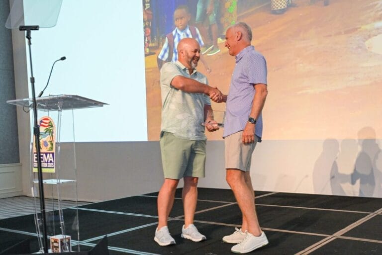 Clay Miller and Kerwin Brown shaking hands at BEMA Convention 2025 in Coco Beach, Puerto Rico