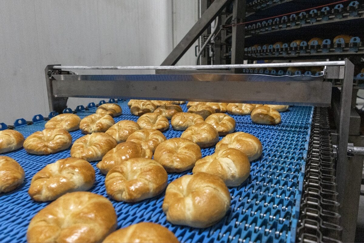 Croissants on production line at Crown Bakeries facility in Pleasant Prairie, WI