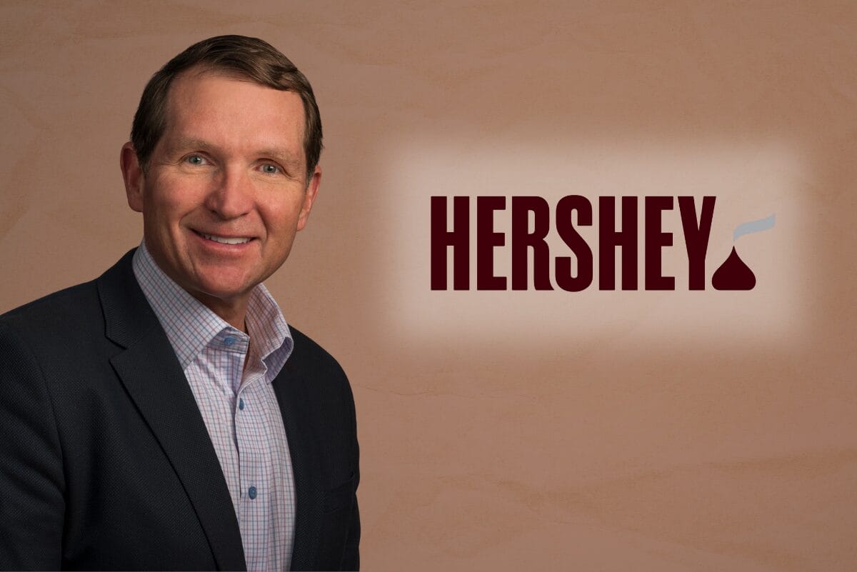 Kirk Tanner, incoming president and CEO of The Hershey Co., and the Hershey logo on light brown background