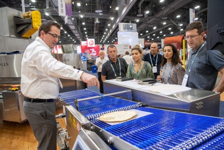 Middleby employee showcasing equipment at IBIE 2022