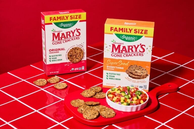 Boxes of Family Size Mary's Gone Crackers on red tiled counter with red background