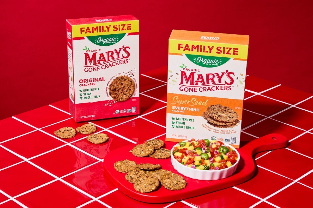 Boxes of Family Size Mary's Gone Crackers on red tiled counter with red background