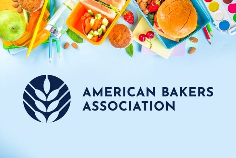 American Bakers Association logo on light blue background with various lunch foods on top