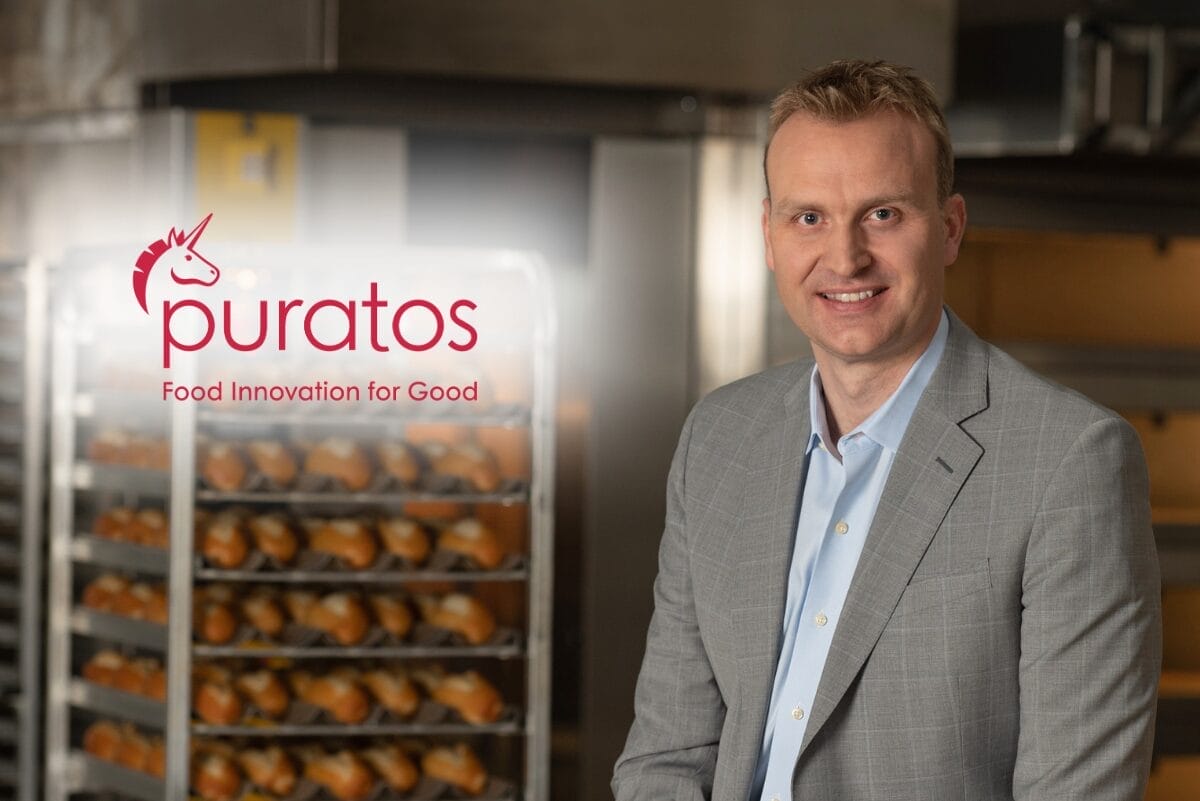 Puratos logo to left of image of Andy Brimacombe with bakery background