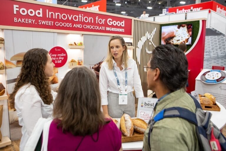 Puratos booth at tradeshow with attendees